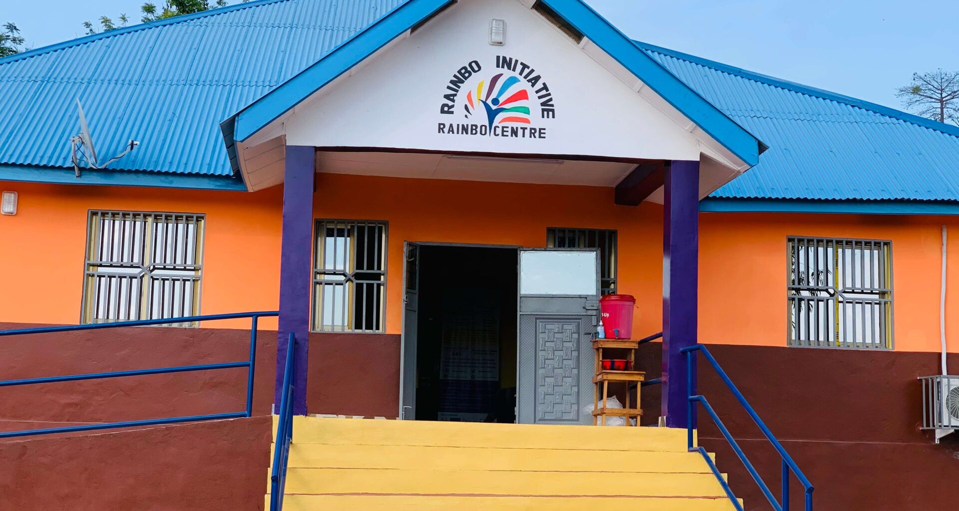 front of a colorful building