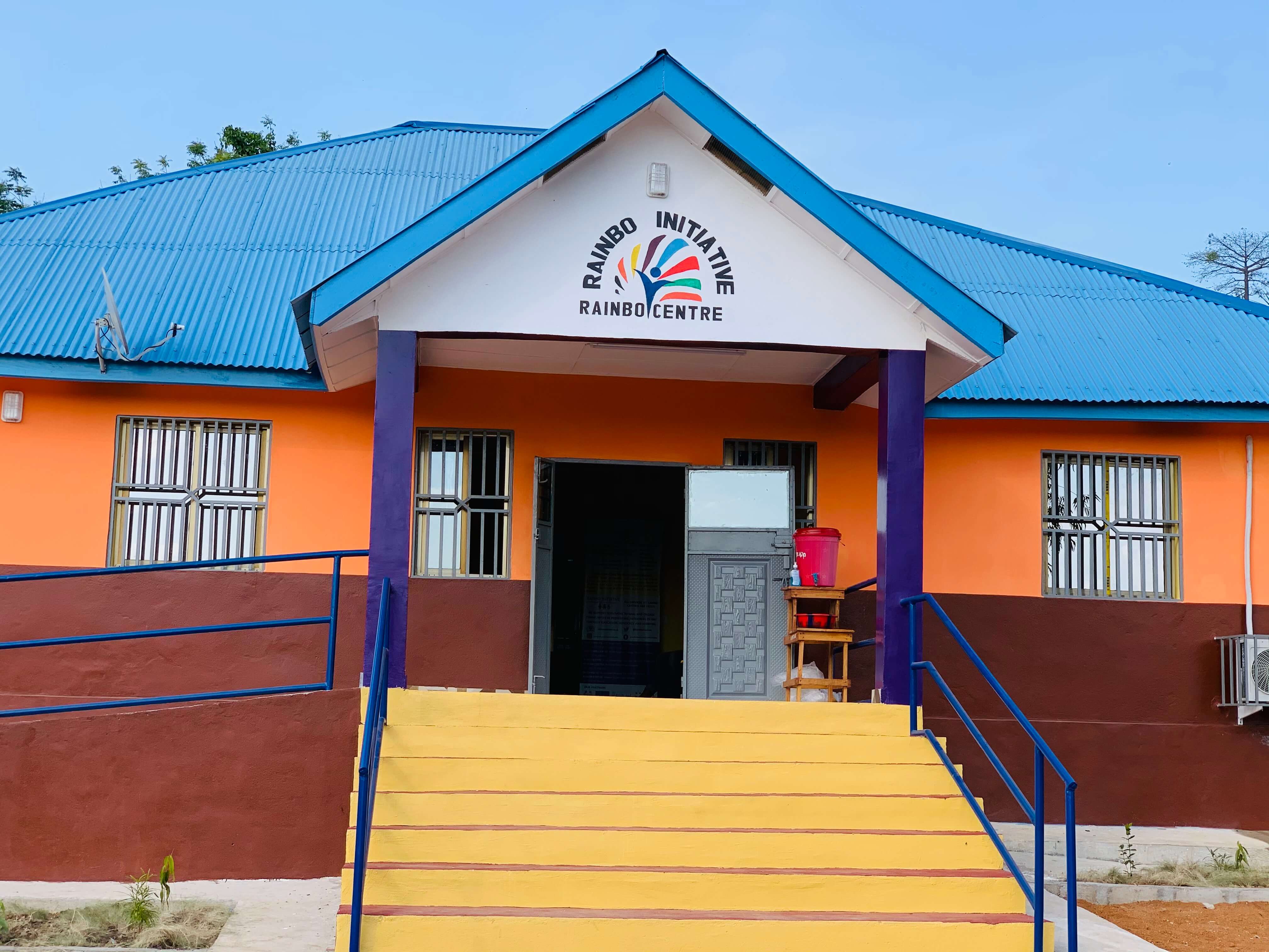 front of a colorful building