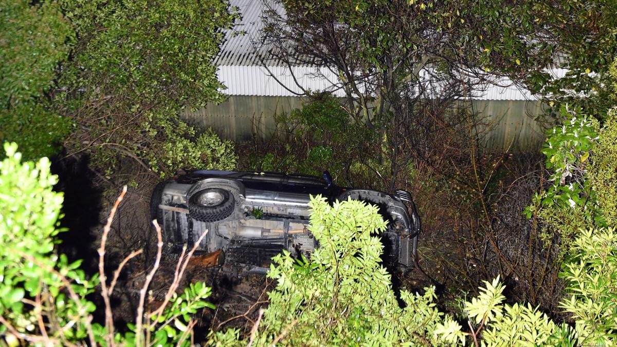 Another icy start: Hilux tumbles down bank