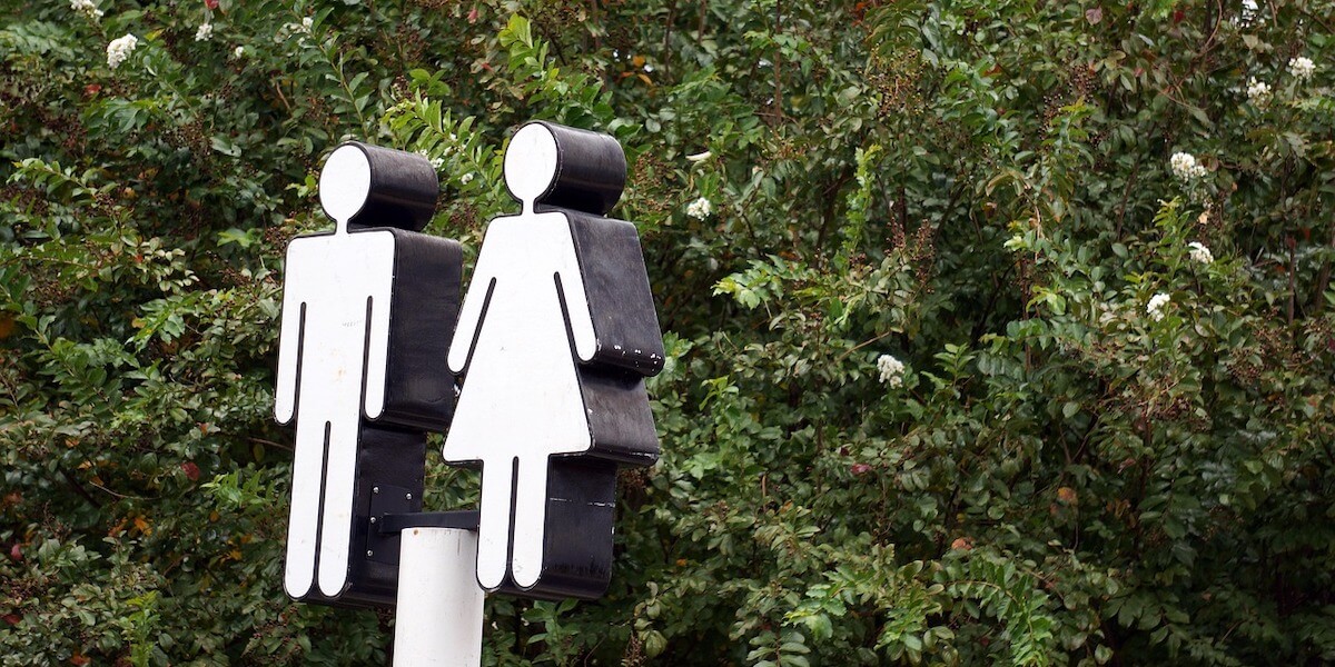 A sign for a restroom