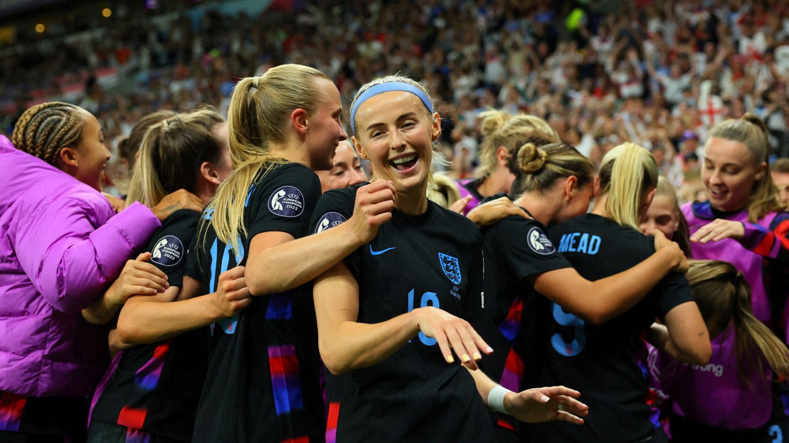 Chloe Kelly, centre, celebrates with her England teammates after scoring the winning goal of the game. Pic: Reuters