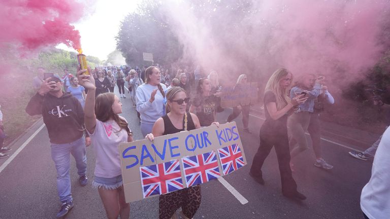Protesters near the Bell Hotel in Epping, Essex. There have been a number of demonstrations outside the hotel, believed to be housing asylum