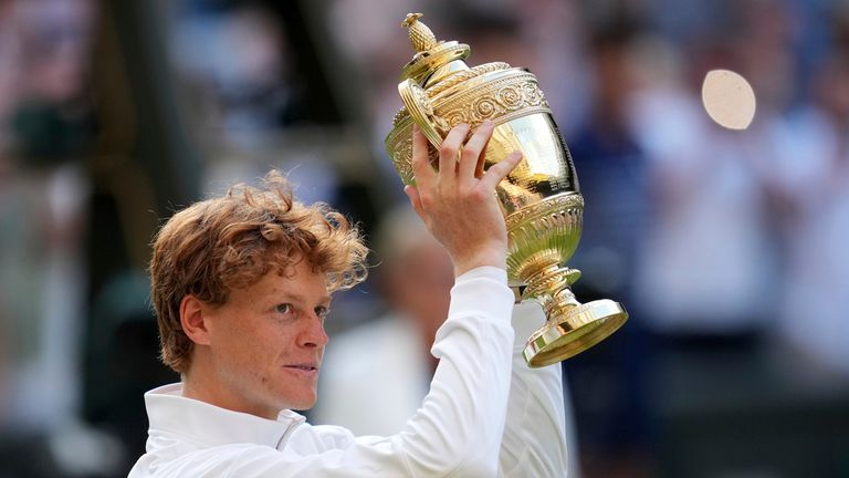 Jannik Sinner lifts the Wimbledon trophy. Pic: AP