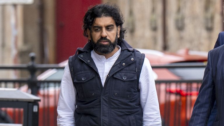 Omer Sheikh, who arrived along with his wife Attiya Sheikh, at Paisley Sheriff Court for sentencing after pleading guilty in May to resettin