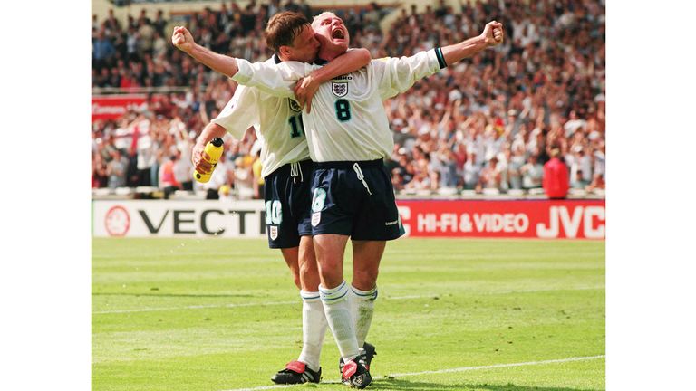 England's Paul Gascoigne celebrates with Teddy Sheringham after scoring against Scotland.
Pic: Reuters