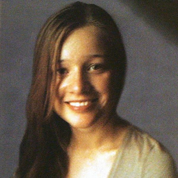 A portrait of murdered Angelika Kluk is displayed during a memorial mass for the Polish student held at the St Peter's Church in Glasgow.