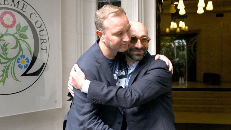 Tom Hayes and Carlo Palombo celebrate after their conviction was overturned.
Pic: Reuters