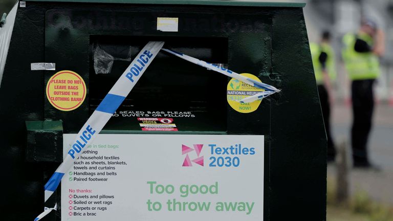 Police security tape is placed across a clothes recycling bin near the Trump Turnberry golf course.