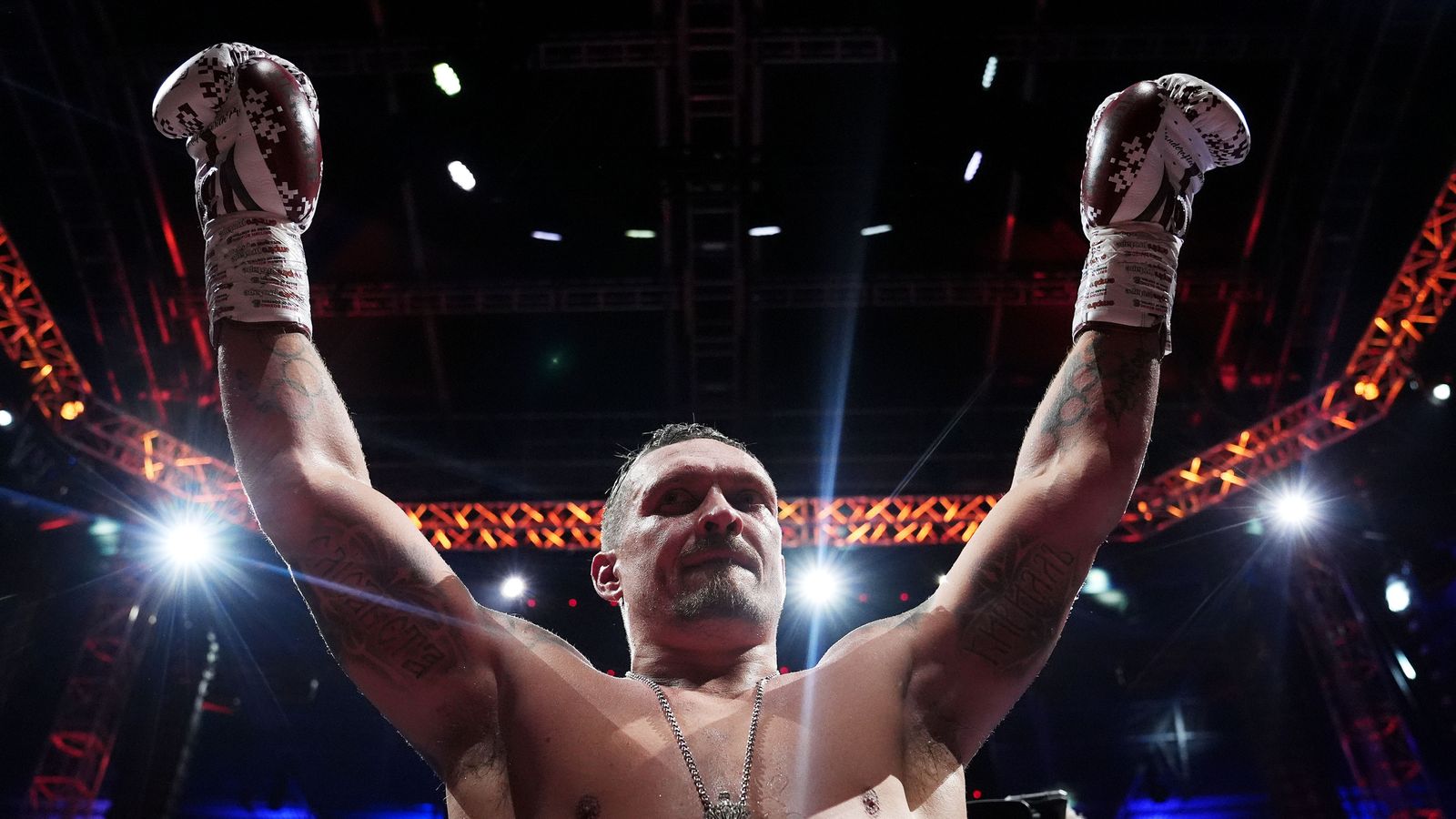 Oleksandr Usyk celebrates after knocking down Daniel Dubois. Pic: PA