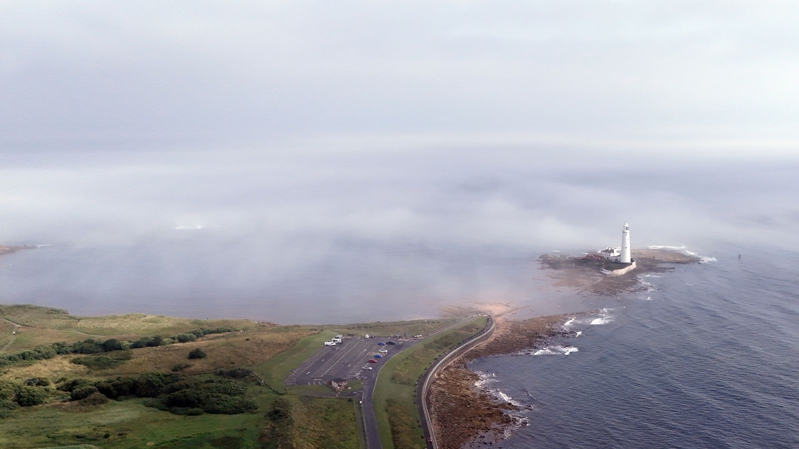 Mist surrounds St Mary's Lighthouse in Whitley Bay, North Tyneside. Pic: PA