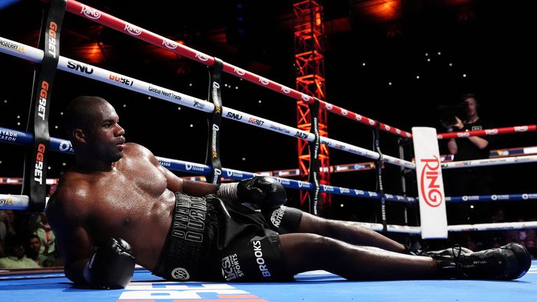Daniel Dubois falls to the canvas after being knocked down by Oleksandr Usyk at Wembley
