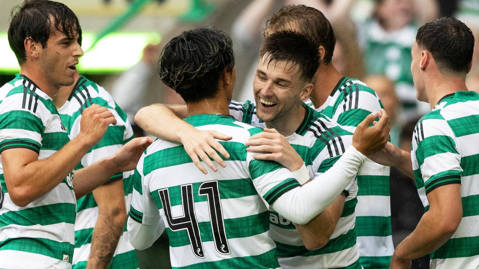 Celtic's Kieran Tierney celebrates with Reo Hatate after Liam Scales scores to make it 4-0 vs Newcastle