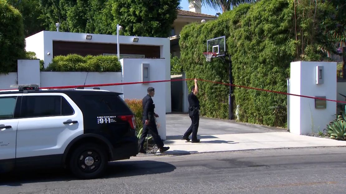 Police work at the scene of the crime.