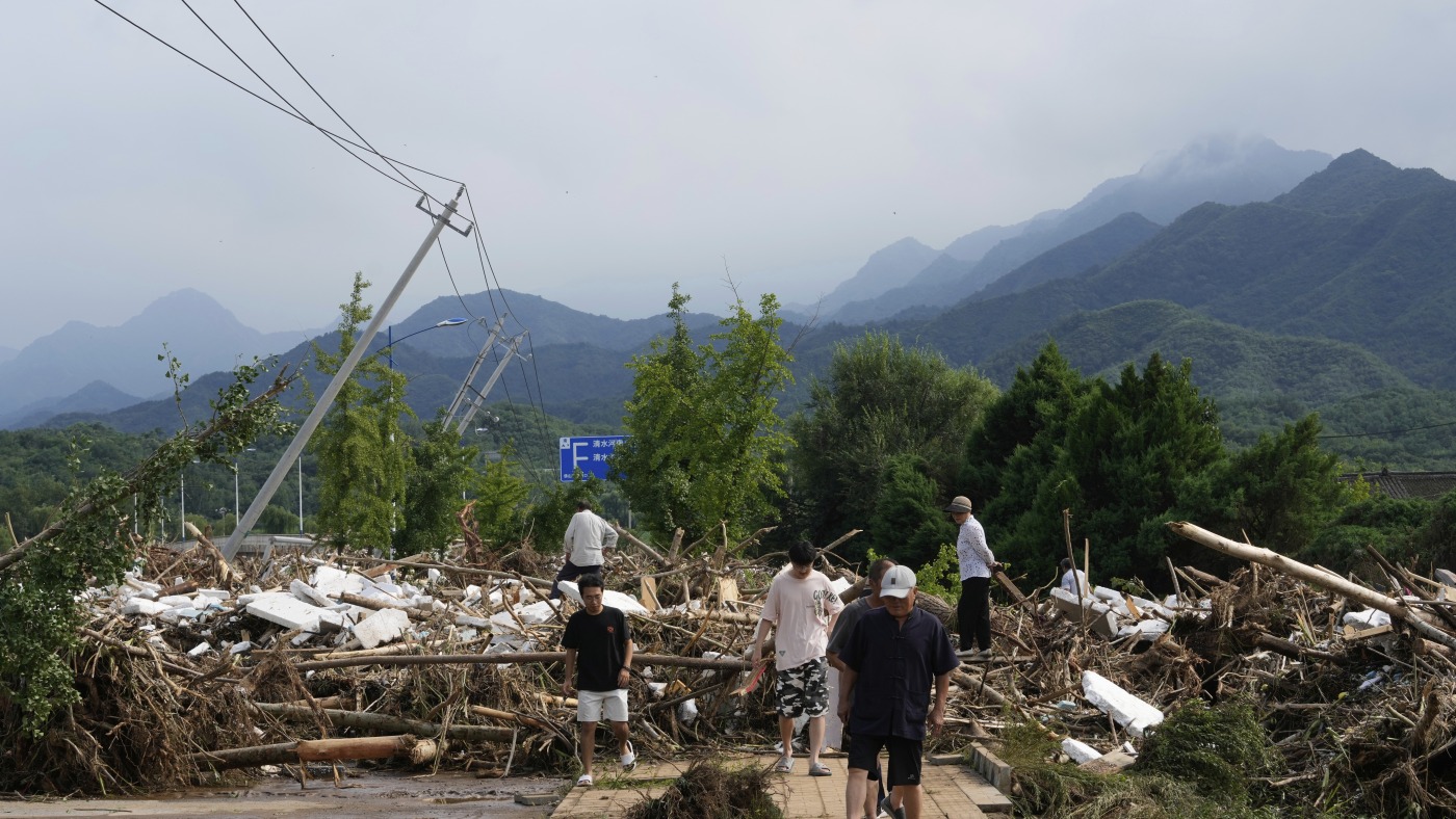 Heavy rains and flooding kill at least 34 people in and near Beijing : NPR