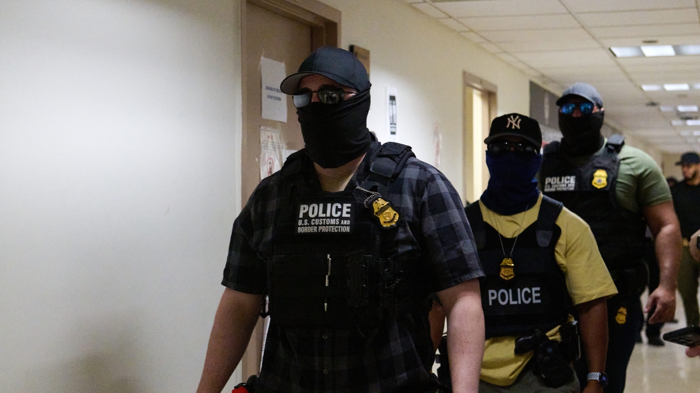 Immigration agents often wear masks, but proposed laws would ban that : NPR