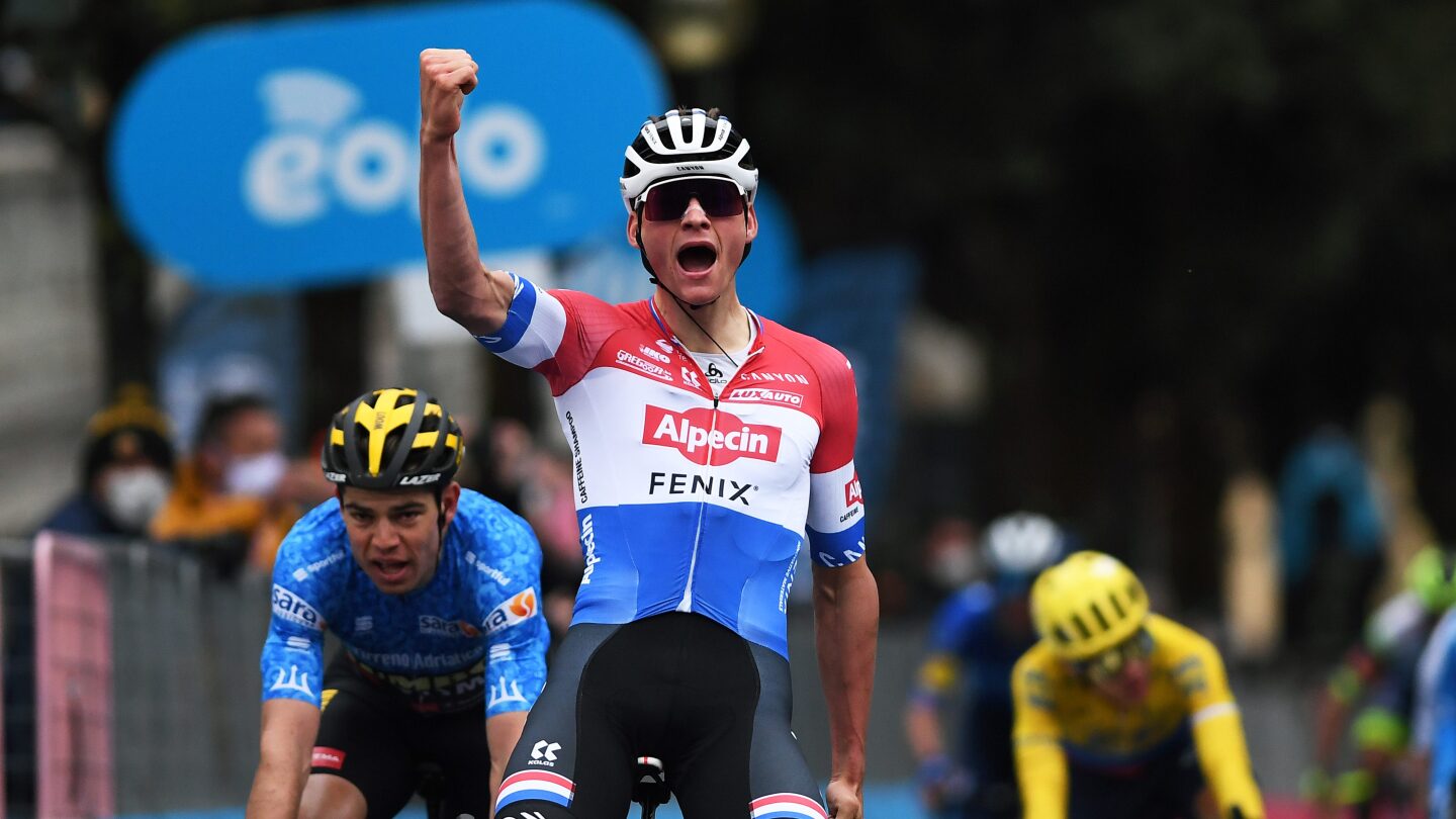 Mathieu van der Poel holds off Tadej Pogačar to win rainy second stage of Tour de France