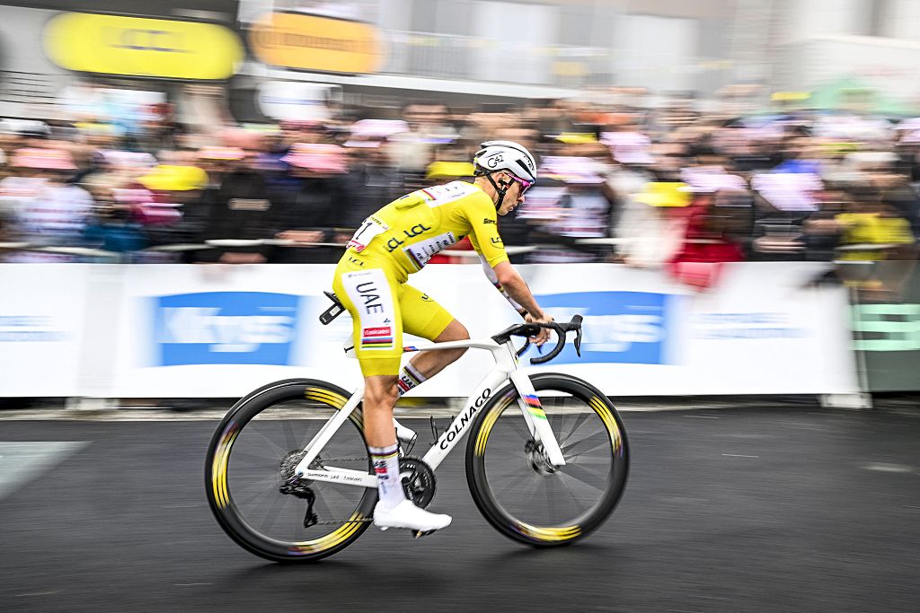 Slovenian Tadej Pogacar of UAE Team Emirates crosses the finish line of stage 14 of the 2025 Tour de France cycling race, from Pau to Luchon-Superbagneres (183 km), on Saturday 19 July 2025 in France. The 112th edition of the Tour de France starts on Saturday 5 July in Lille, France, and will finish in Paris, France on the 27th of July. BELGA PHOTO JASPER JACOBS (Photo by JASPER JACOBS / BELGA MAG / Belga via AFP)