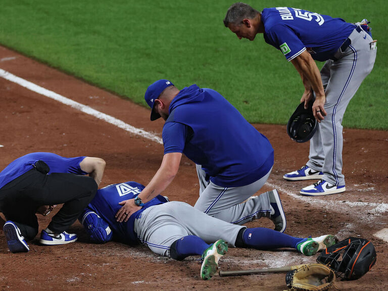 Blue Jays' Springer under evaluation after taking pitch to head