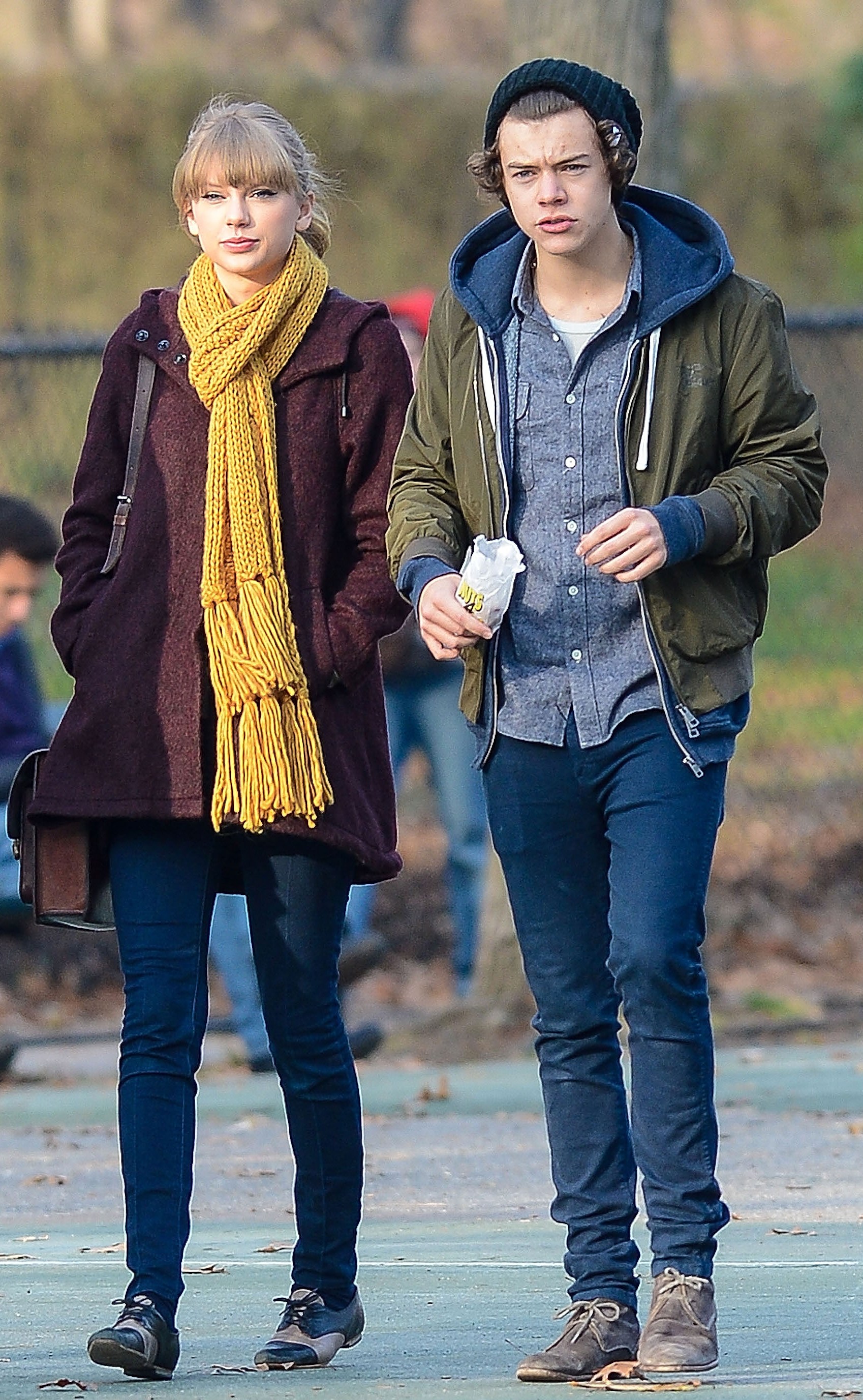 Taylor Swift and Harry Styles walking in Central Park.