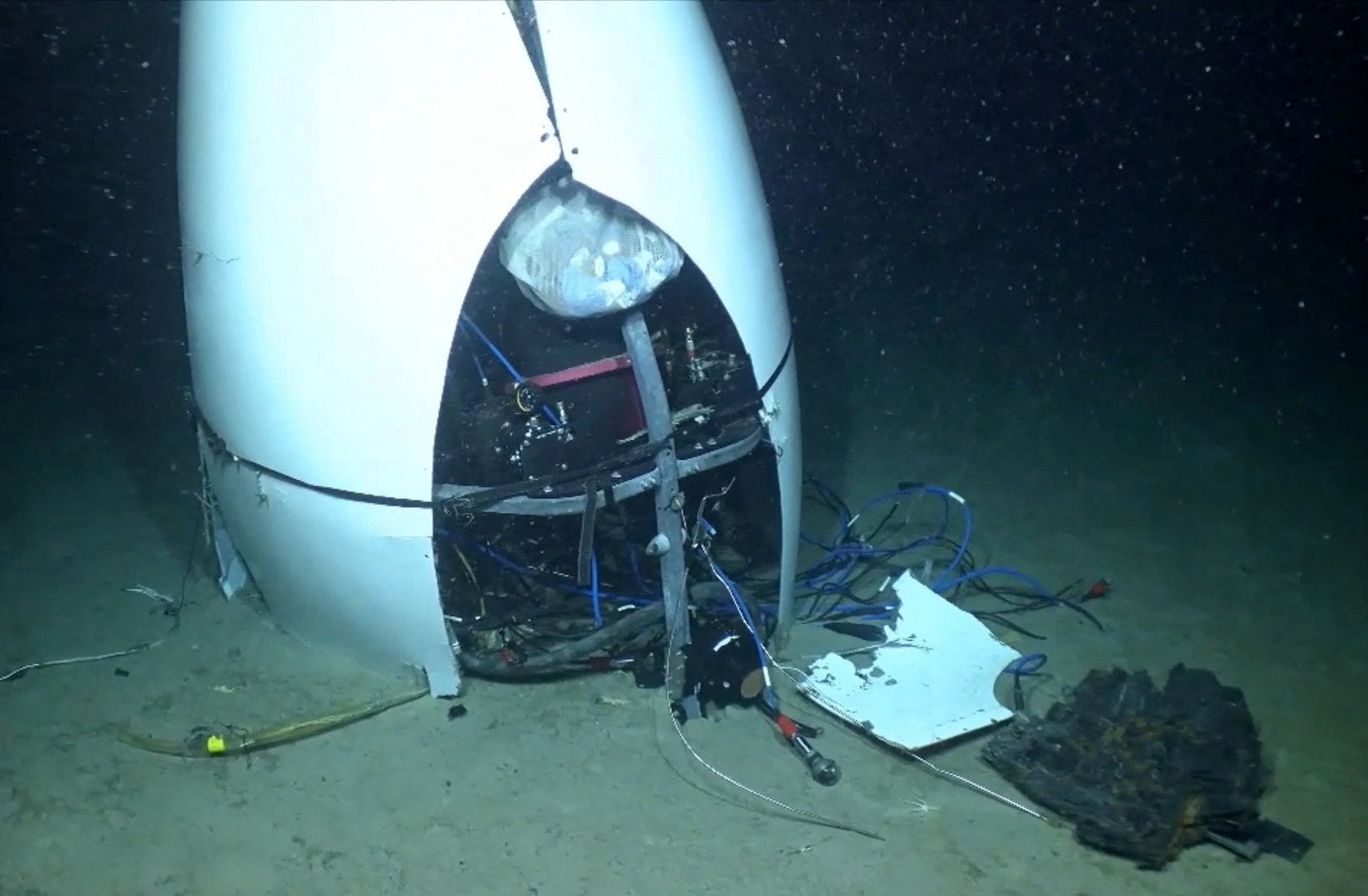 Debris of the imploded Titan submersible on the ocean floor.