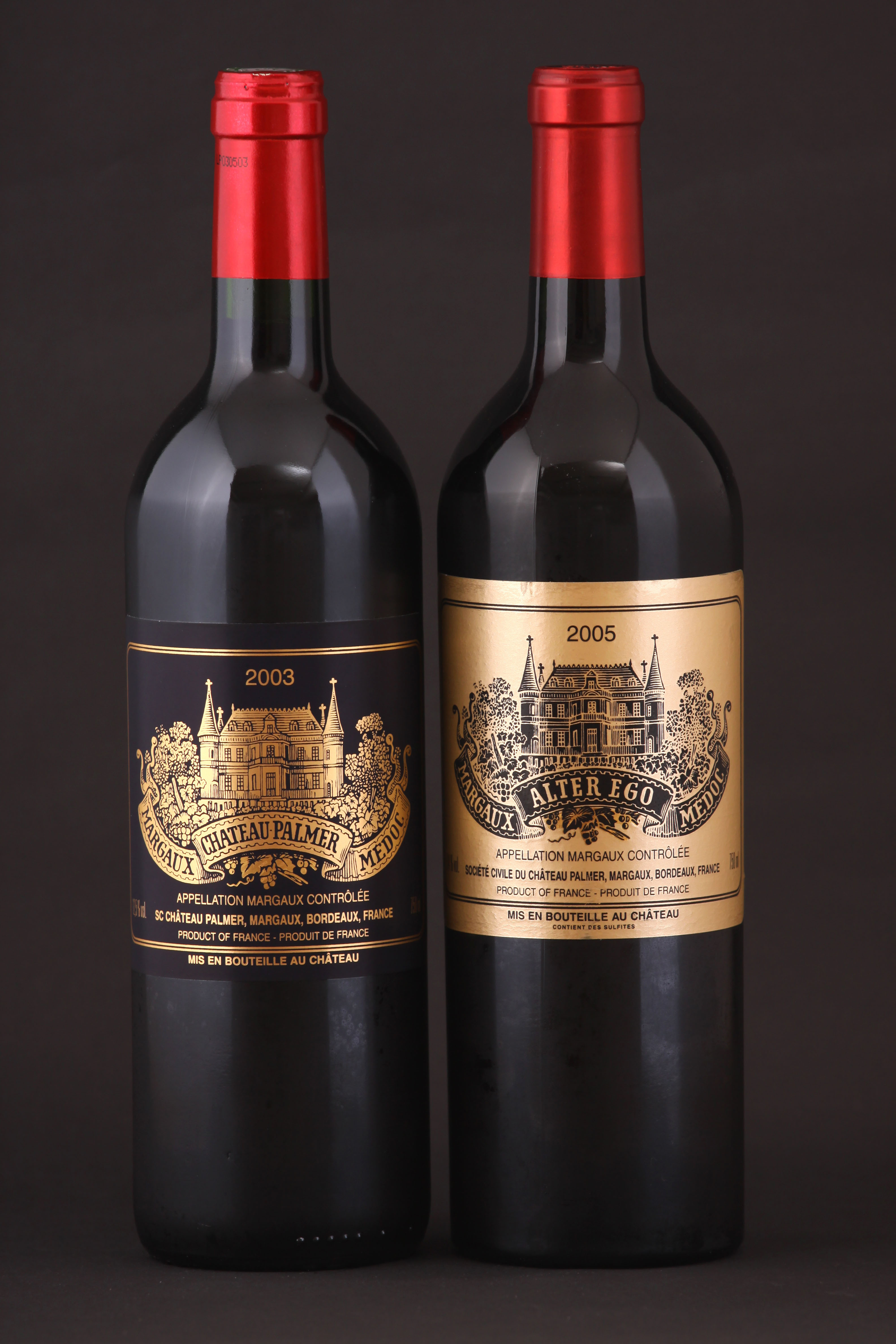 Two bottles of French red wine: 2003 Chateau Palmer and 2005 Alter Ego.