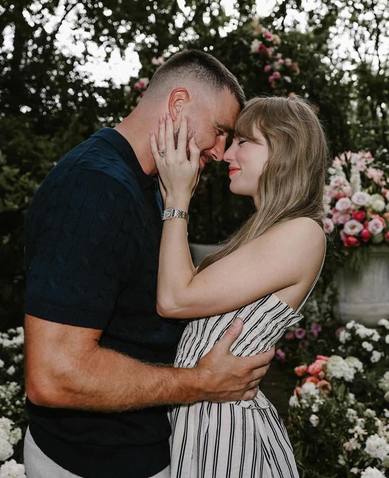 Couple embracing in a garden.
