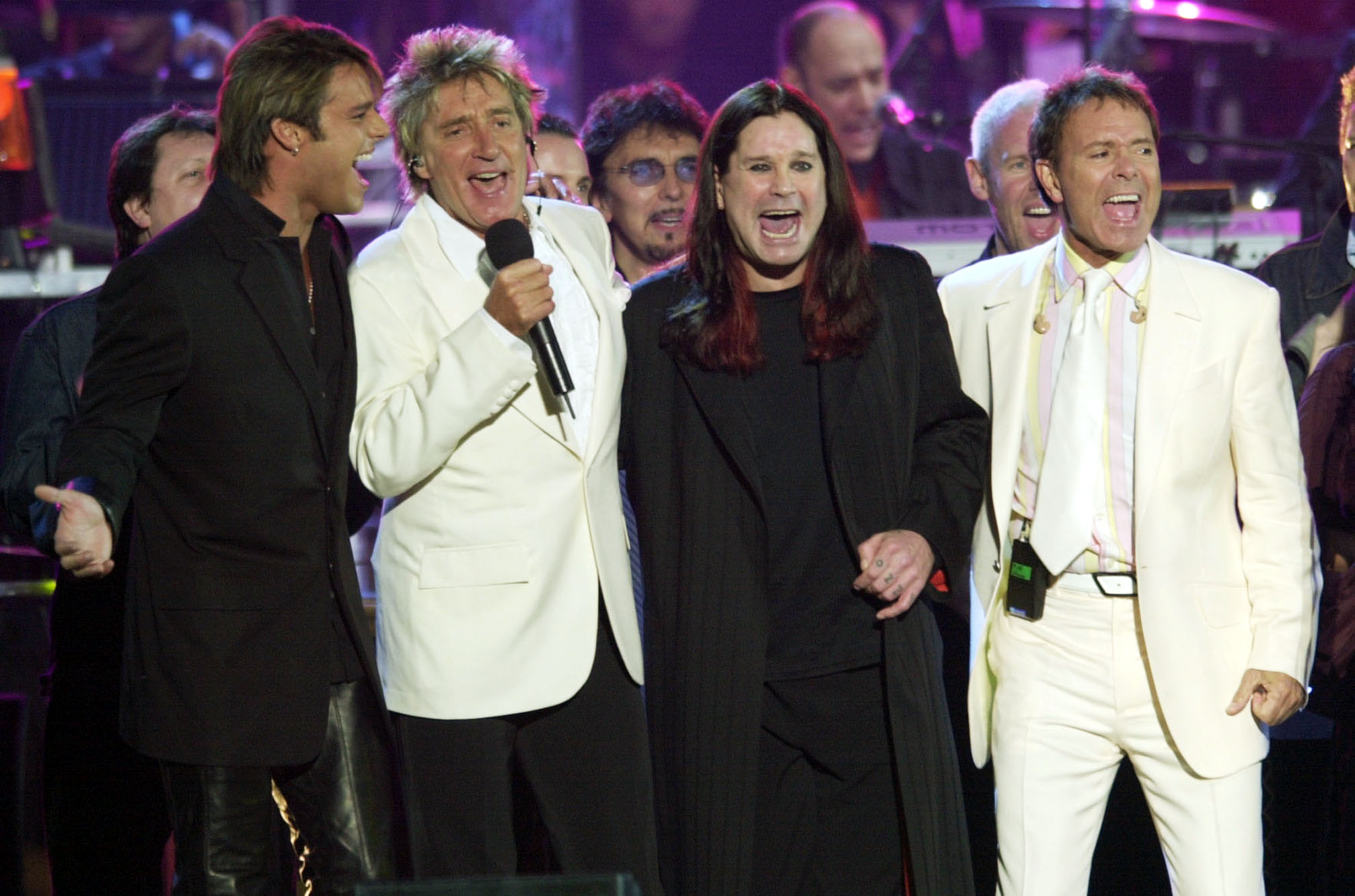Ricky Martin, Rod Stewart, Ozzy Osbourne, and Cliff Richard performing at the Golden Jubilee concert.