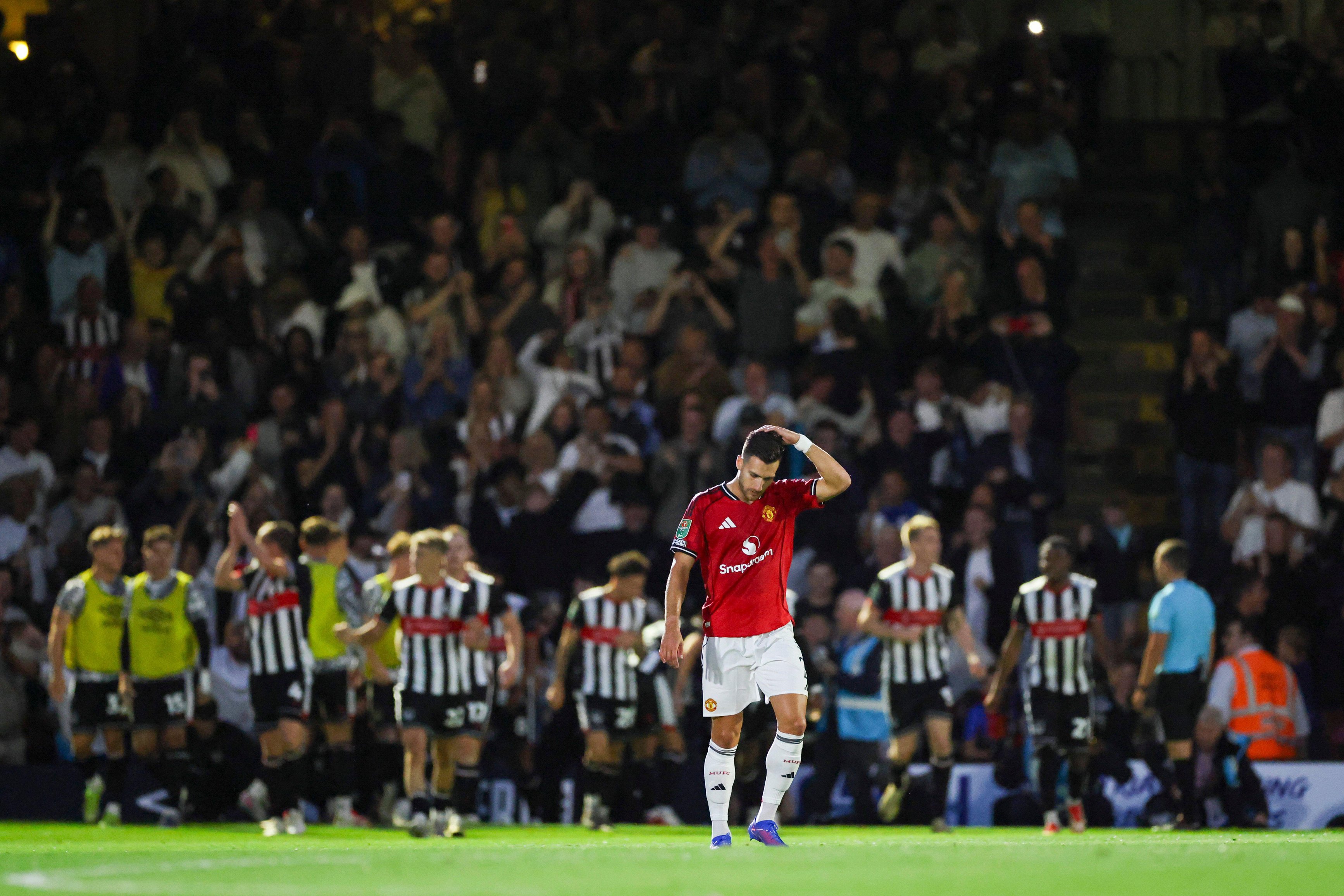 Manchester United defender Diogo Dalot (2) dejected after Grimsby goal during the Grimsby Town FC v Manchester United FC Carabao Cup 2nd Round match at Blundell Park, Cleethorpes, England, United Kingdom on 27 August 2025 Credit: Phil Duncan/Every