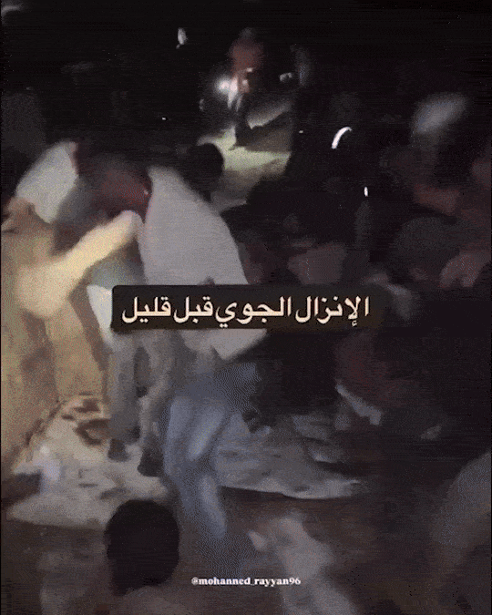 Crowd helping someone.