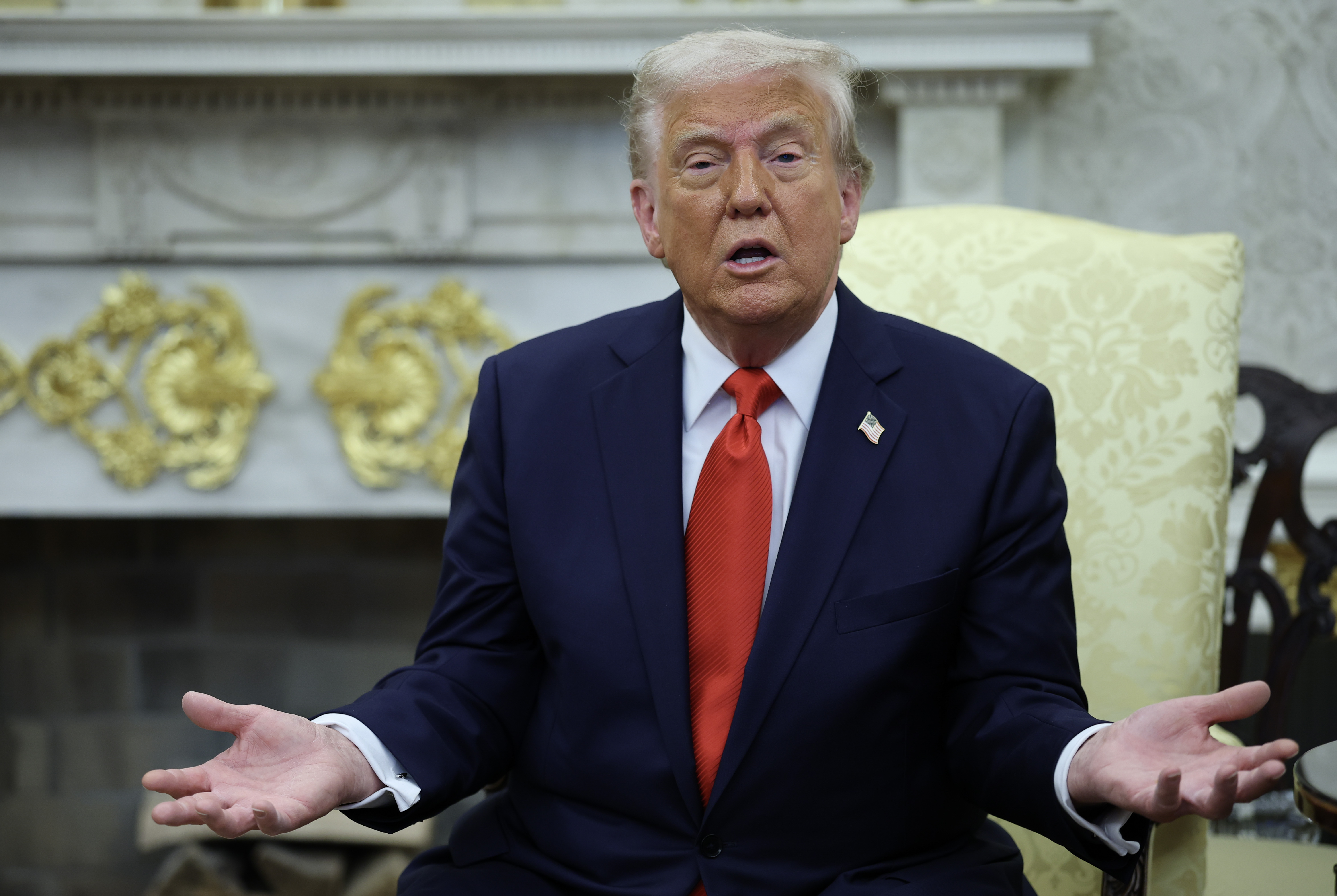 President Trump speaking during a meeting in the Oval Office.