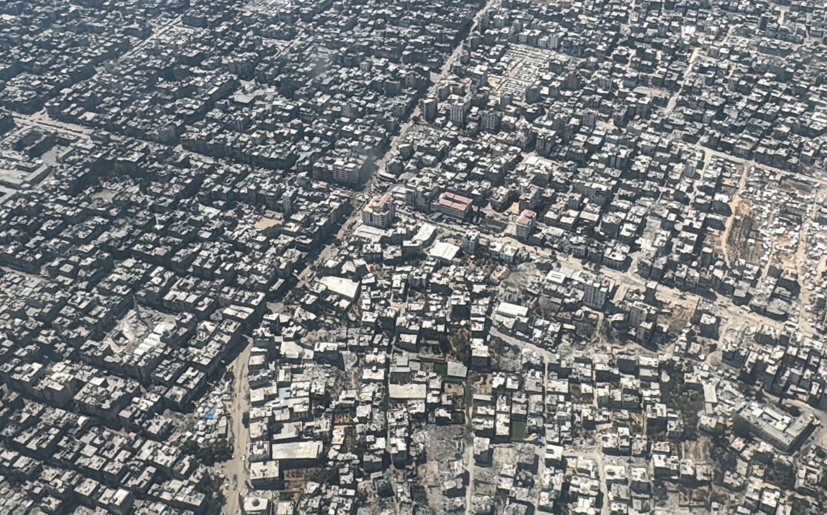 Aerial view of damaged buildings in Gaza.