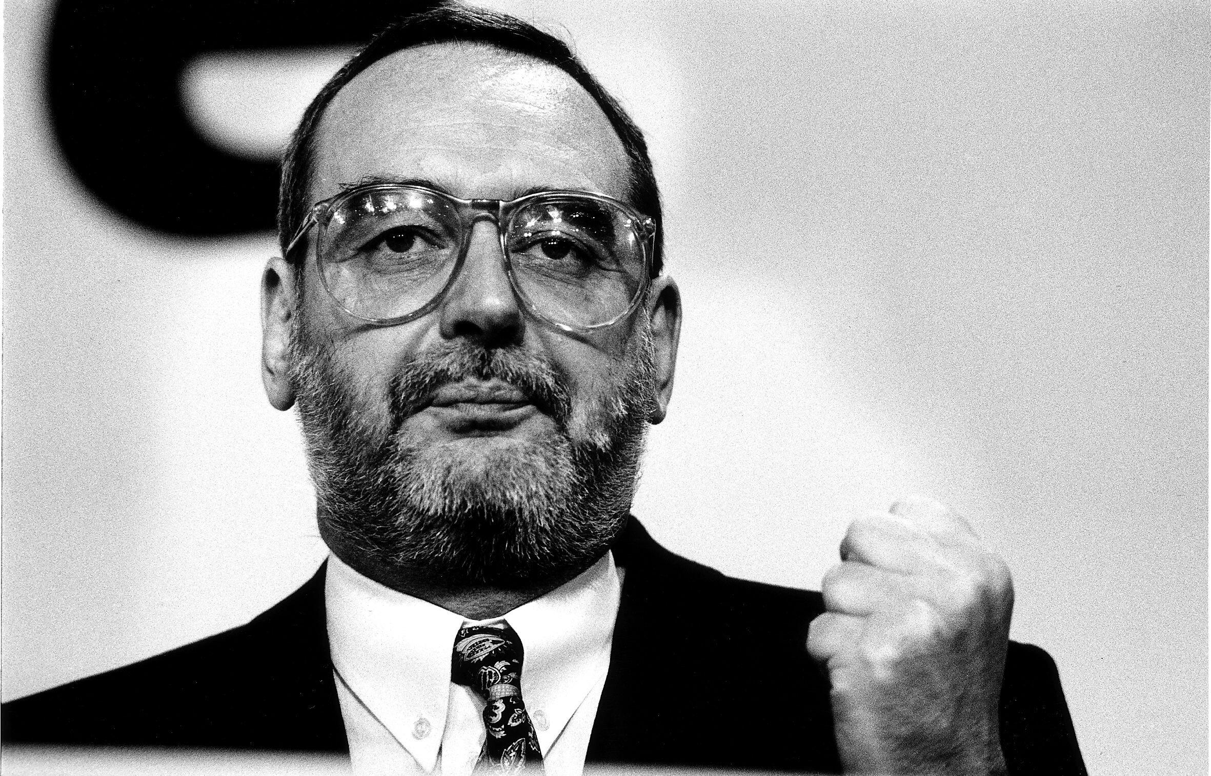 Black and white photo of Tom Sawyer at a Labour Party conference.