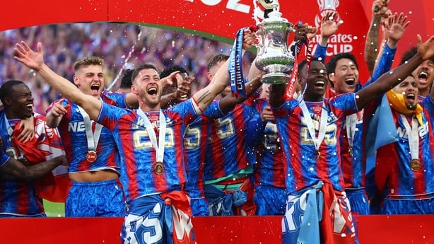 LONDON, ENGLAND - MAY 17: Joel Ward and Marc Guehi of Crystal Palace celebrate with the trophy at full-time following the Emirates FA Cup Final match between Crystal Palace and Manchester City at Wembley Stadium on May 17, 2025 in London, England. (Photo by Chris Brunskill/Fantasista/Getty Images)