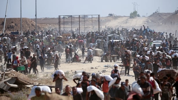 Palestinians at a food distribution point run by the US and Israeli-backed Gaza Humanitarian Foundation in Gaza.