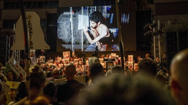 Families of hostages in Tel Aviv watch a video released by Hamas showing Evyatar David, an Israeli hostage.