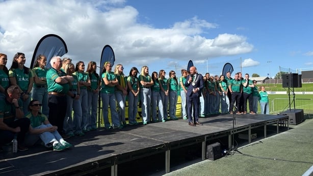 The Meath ladies team standing on a stage in Páirc Tailteann, Navan