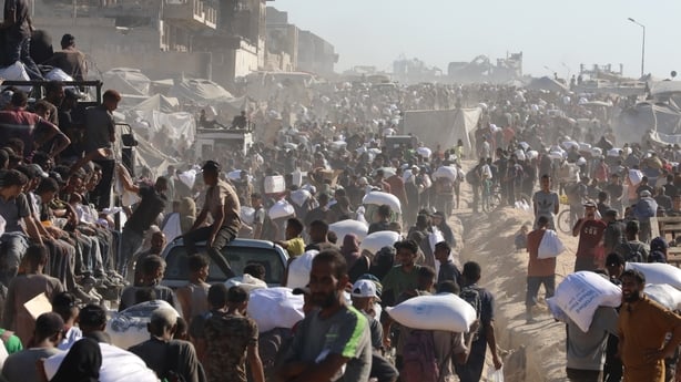 Palestinians at a humanitarian aid distribution point near Zikim Border Gate in Gaza.