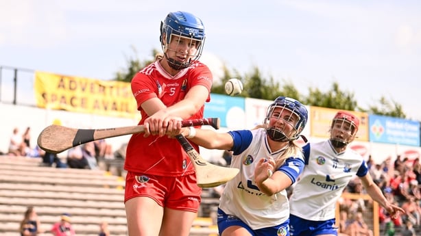 26 July 2025; Aoife Healy of Cork in action against Annie Fitzgerald of Waterford during the Glen Dimplex All-Ireland Camogie Senior Championship semi-final match between Cork and Waterford at UPMC Nowlan Park, Kilkenny. Photo by Ben McShane/Sportsfile