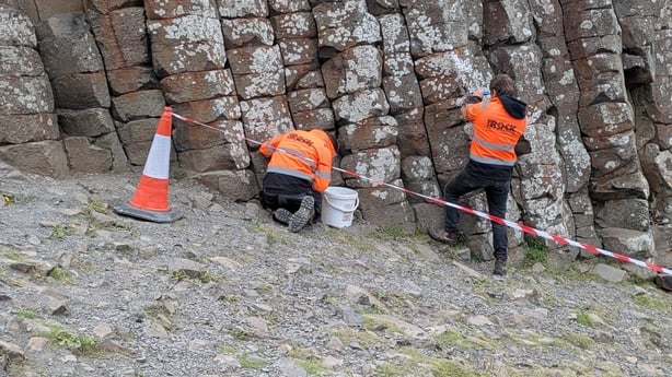 Workers at a rock fall at one of Northern Ireland's best known natural wonders the Giant's Causeway