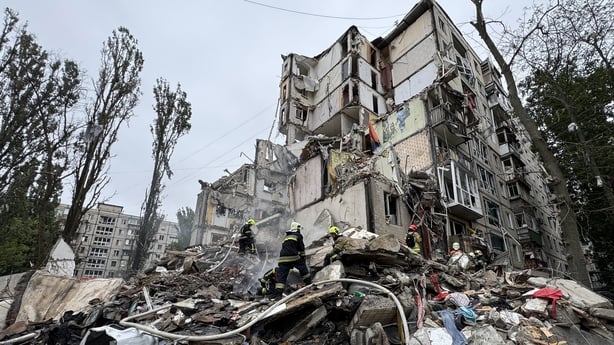 Ukrainian emergency work amid the rubble of a residential building after an air attack in Kyiv on July 31, 2025,