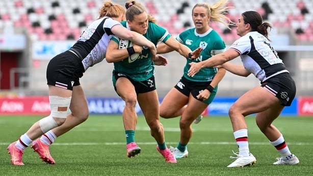 9 August 2025; Beibhinn Parsons of Ireland is tackled by Paige Farries and Claire Gallagher of Canada during the Women's Rugby World Cup warm-up match between Ireland and Canada at Affidea Stadium in Belfast. Photo by Ramsey Cardy/Sportsfile