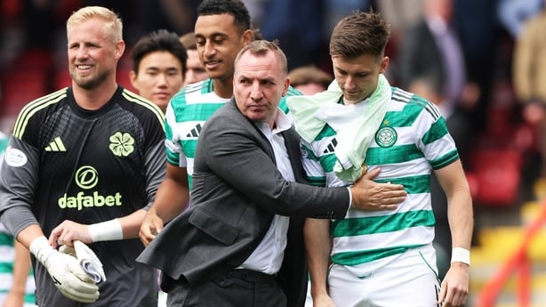 ABERDEEN, SCOTLAND - AUGUST 10: Celtic Manager Brendan Rodgers with Kieran Tierney at Full Time during a William Hill Premiership match between Aberdeen and Celtic at Pittodrie, on August 10, 2025, in Aberdeen, Scotland. (Photo by Craig Williamson/SNS Group via Getty Images)