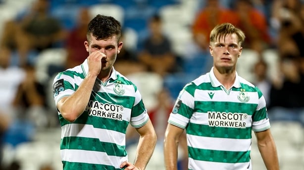[Josh Honohan of Shamrock Rovers, left, reacts during the UEFA Conference League Third Qualifying Round first leg match between Ballkani and Shamrock Rovers at Fadil Vokrri Stadium in Pristina, Kosovo