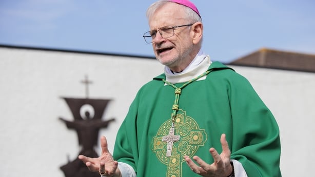Bishop Alan McGuckian speaking outside St Colmcille's Church in Downpatrick Co Down