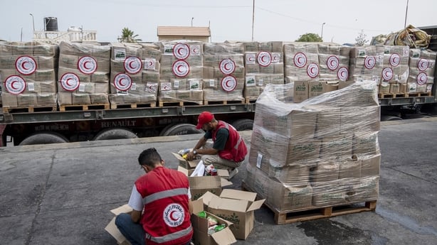 AL-ARISH, EGYPT - AUGUST 11: Members of the Egyptian Red Crescent packing aid at the aid warehouse in Al-Arish near Rafah crossing between Egypt and Gaza on August 11, 2025 in Al-Arish, Egypt. The Elders are an NGO of former statesmen, peace activists and human rights advocates, who were first conve