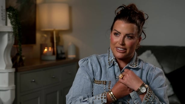 A woman in a denim jacket