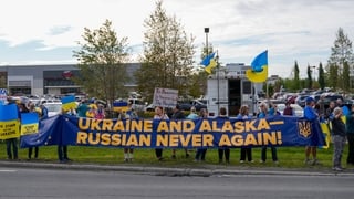 Ukraine supporters gather in a demonstration ahead of the meeting between US President Donald Trump and Russian President Vladimir Putin in Anchorage, Alaska