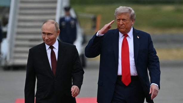 Presidents Putin and Trump walking