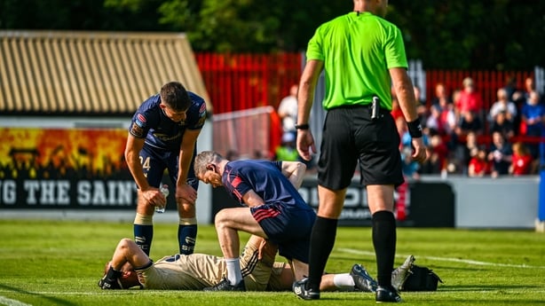 17 August 2025; Shelbourne goalkeeper Conor Kearns receives medical attention after sustaining an injury during the Sports Direct Men's FAI Cup third round match between St Patrick's Athletic and Shelbourne at Richmond Park in Dublin. Photo by Ben McShane/Sportsfile