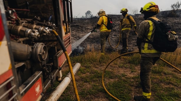 Firefighters continue their efforts to extinguish the forest fire in Queirugas, Ourense, Galicia, Spain